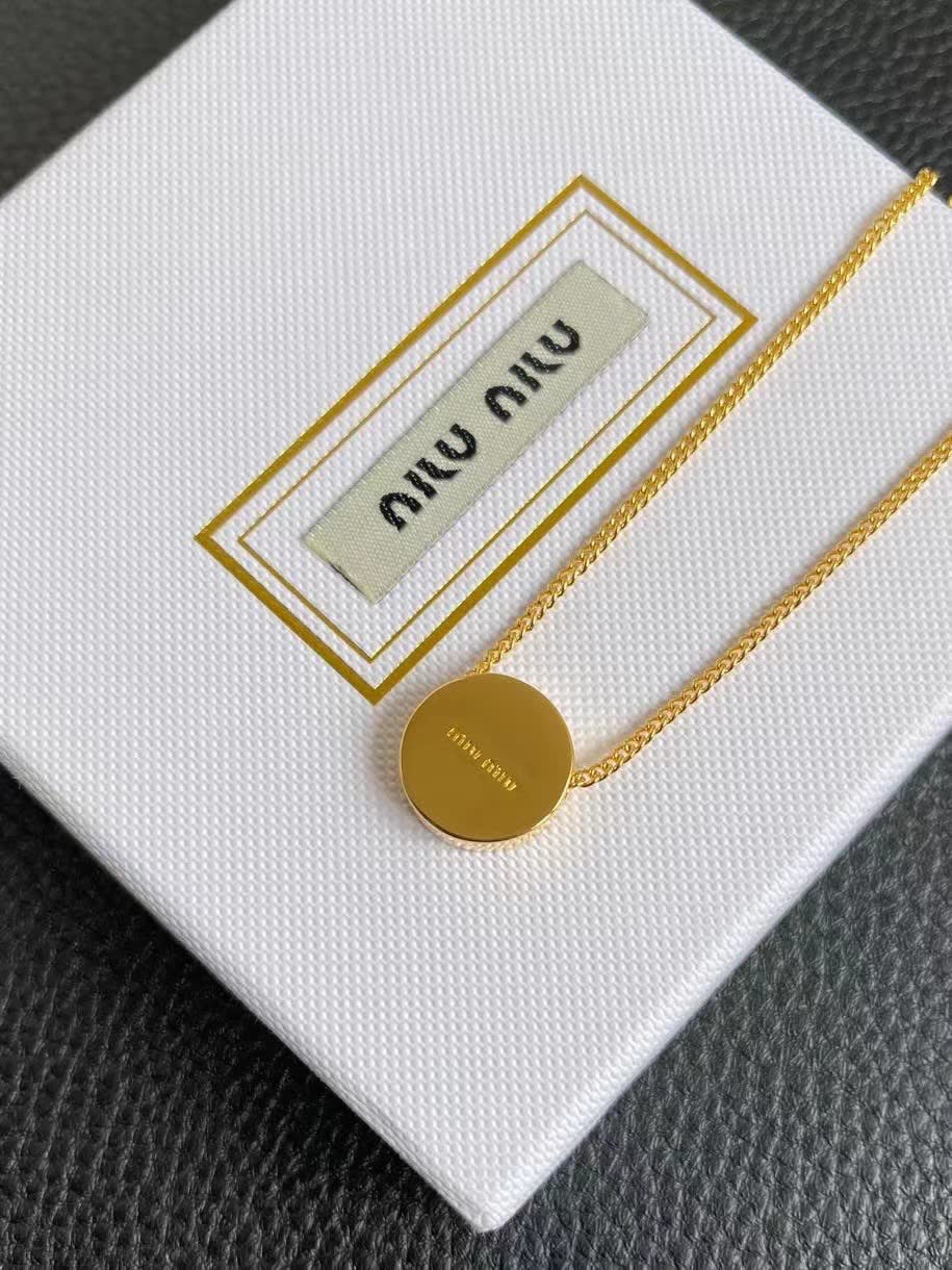Miu Miu necklace with red circular pendant